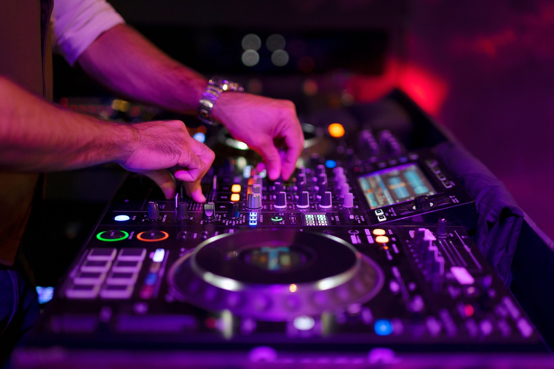 DJ spend night time for work at night club.